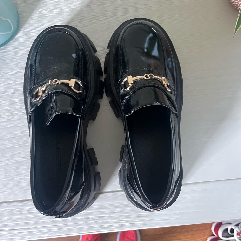 Princess Polly Glossy Black Loafers with Gold Detail